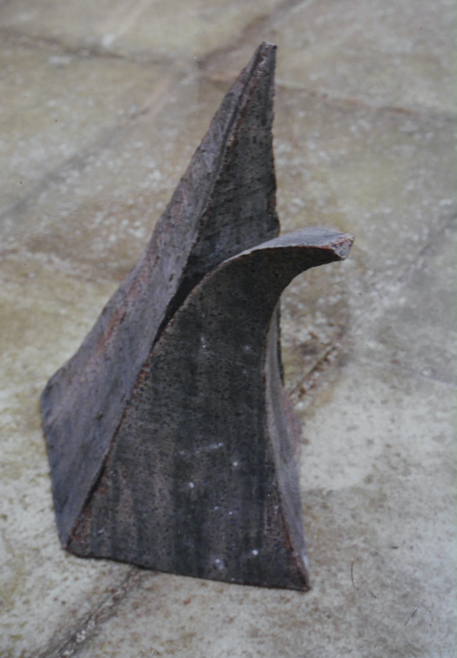 contemporary fine art ceramic sculpture of a deformed cone by Christian Dodd