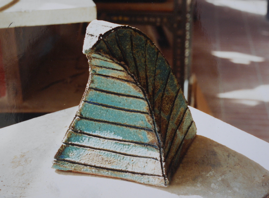 contemporary fine art ceramic sculpture of a wave form pyramid by Christian Dodd